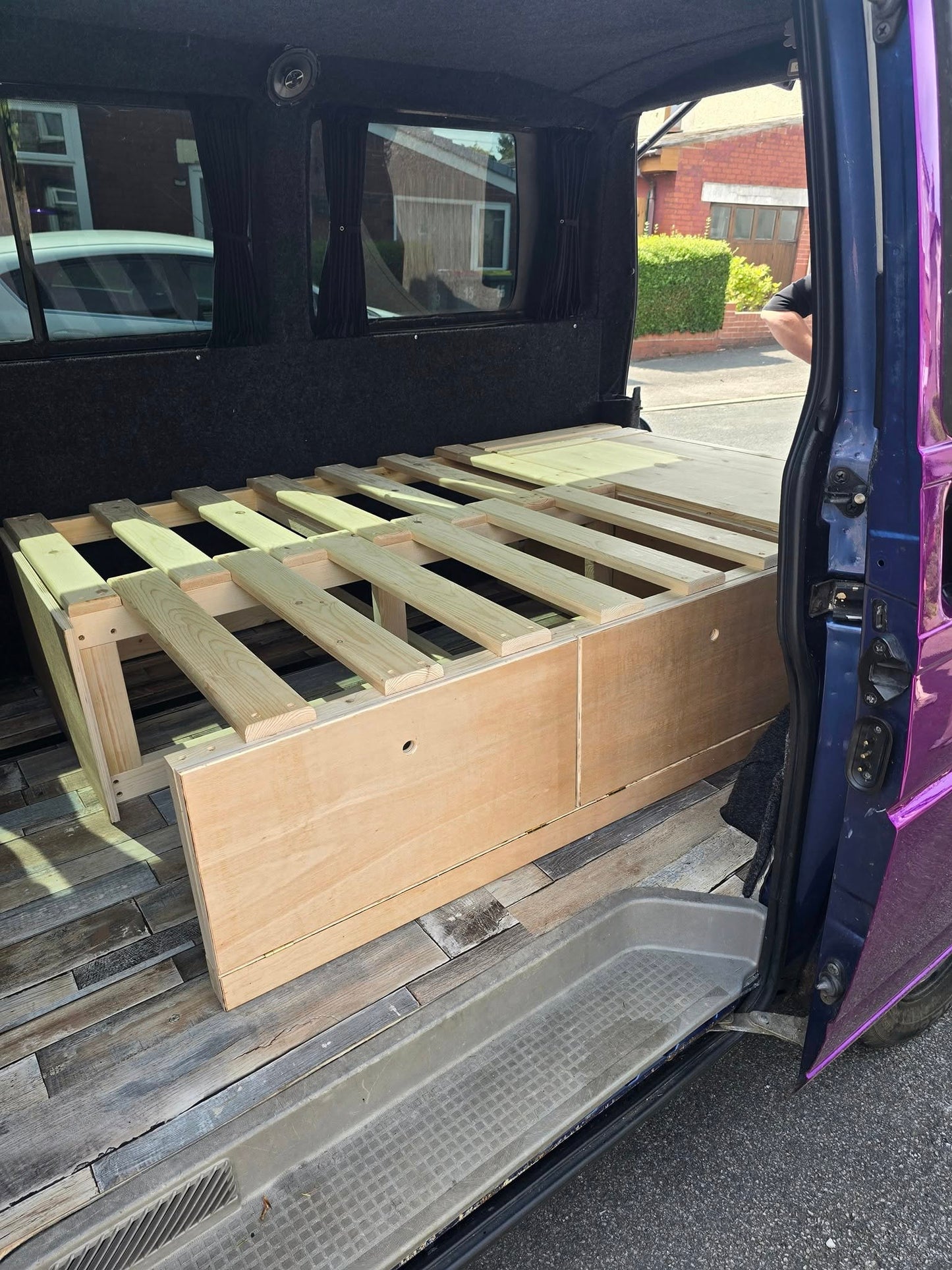 VW Caravelle L-Shape Seating/Pull out bed - Optional Heavy duty Pull-Out Drawer/Kitchen Unit. VW L-Shape seating