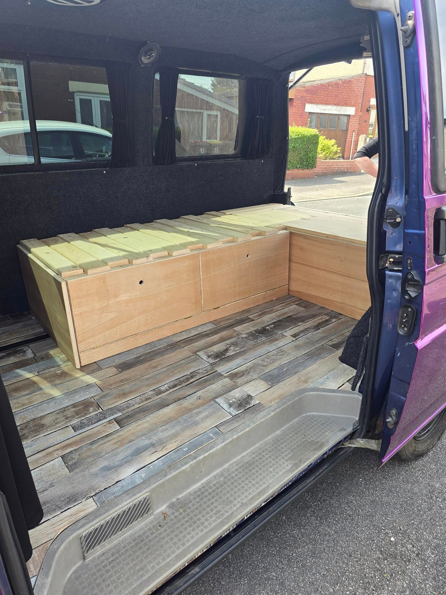 VW Caravelle L-Shape Seating/Pull out bed - Optional Heavy duty Pull-Out Drawer/Kitchen Unit. VW L-Shape seating