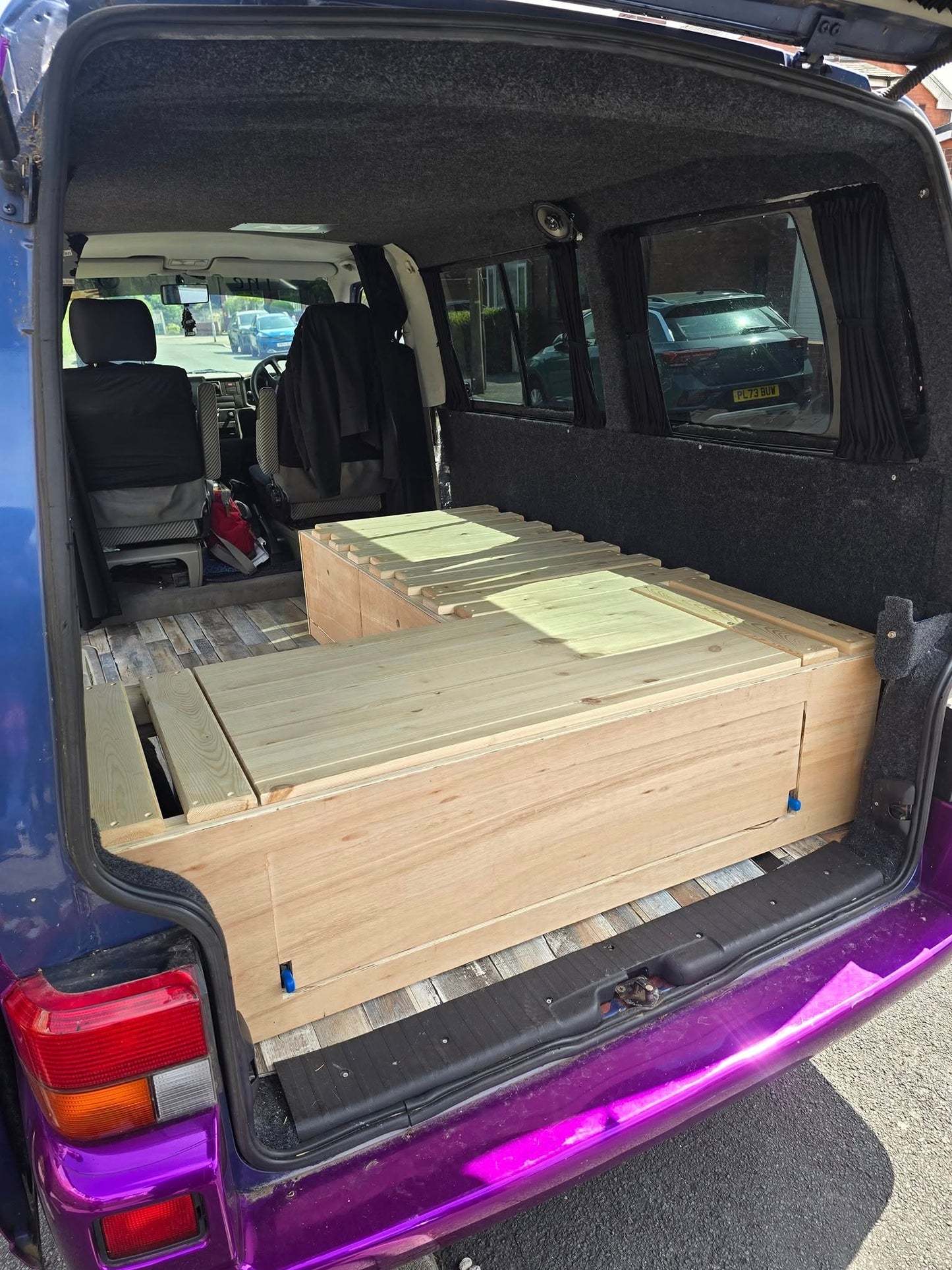 VW Caravelle L-Shape Seating/Pull out bed - Optional Heavy duty Pull-Out Drawer/Kitchen Unit. VW L-Shape seating